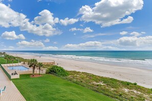 On the beach, sun loungers, beach towels