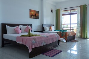 Standard Triple Room, Sea View | Desk, laptop workspace, free WiFi, bed sheets