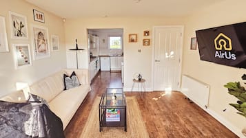 House | Living area | 55-inch Smart TV with digital channels