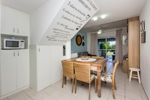 Apartment | Dining - Residencial Guilhermina (Bombinhas)