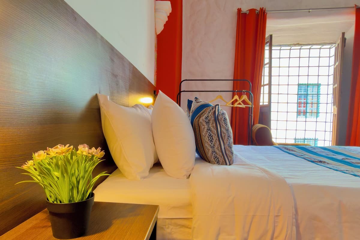 Desk, free WiFi, bed sheets