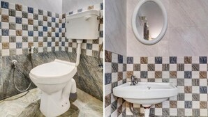 Deluxe Double Room | Bathroom | Towels - Preethi Hotel - Urban Express Stay (Anekal)
