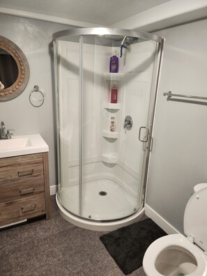 Shower, towels, soap, shampoo
