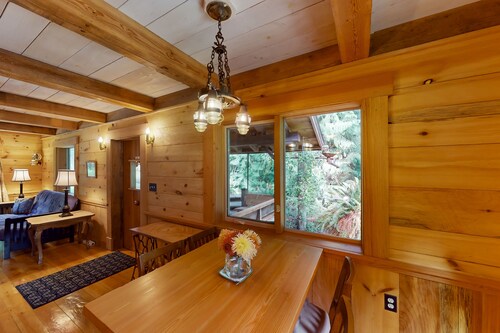 Charming woodland cottage with 2 covered porches, wood stove, treehouse, firepit