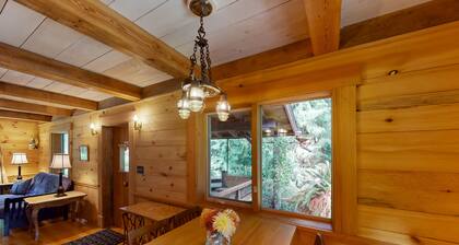 Charming woodland cottage with 2 covered porches, wood stove, treehouse, firepit