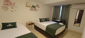 Quarto empresarial | Roupas de cama antialérgicas, escrivaninha