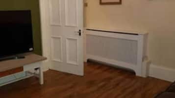 Apartment | Living area | 40-inch Smart TV with digital channels, Netflix, streaming services