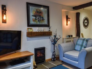 Living area - This quaint chocolate box cottage is nestled in the heart of Cartmel village. (Cartmel)