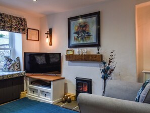 Living area - This quaint chocolate box cottage is nestled in the heart of Cartmel village. (Cartmel)