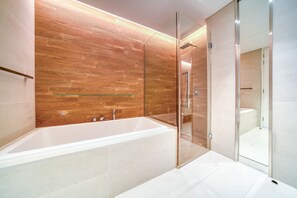 Bathtub, hair dryer, towels