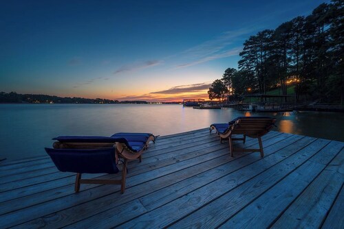 Renovated lake front home with great views & swim dock!