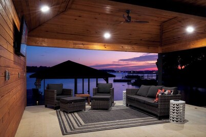 Renovated lake front home with great views & swim dock!