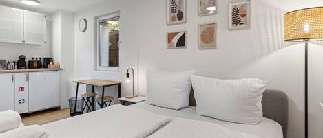 1 bedroom, desk, iron/ironing board, travel cot