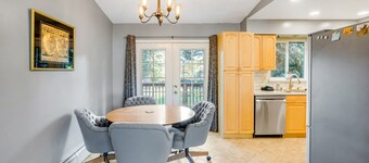 Dog-friendly home with a fenced yard, putting green, & shared washer/dryer