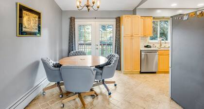 Dog-friendly home with a fenced yard, putting green, & shared washer/dryer