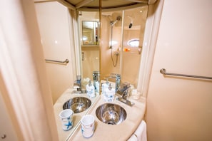 Shower, towels, soap, shampoo
