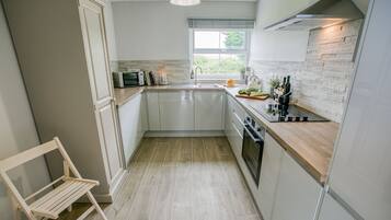 Fridge, microwave, oven, high chair