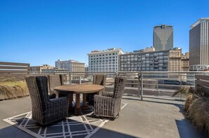Outdoor dining - Modern 4BR Condo in the Heart of NOLA (New Orleans)