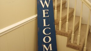A staircase with a blue 'WELCOME' sign. - A Bigger Catch Supply, NC ICW Best Fishing Hole In Brunswick County NC!!!! (Supply)