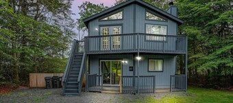 Stylish Poconos Retreat w/ Hot Tub, Firepit, Pool Table, Games, & Country Club