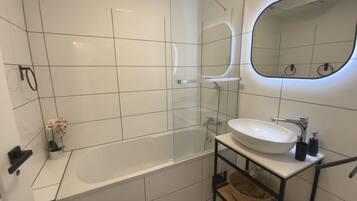 Hair dryer, towels, soap, toilet paper