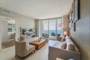 Luxury Condo, 2 Bedrooms, Beach View | Living area | 50-inch Smart TV with cable channels