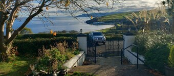 Traditional 5 bedroom house overlooking Cushendun bay. Pet friendly.