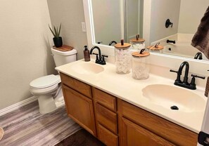 Hair dryer, towels, soap, shampoo
