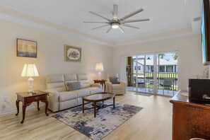 TV - Closest to the Pool! - Updated, Bright & Cheery - Condo Serenity Cove - Roelens Vacations (Cape Coral)