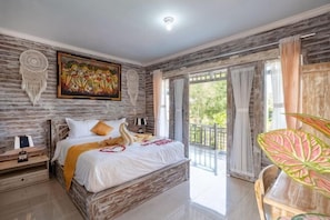 A bedroom with a bed, bedside tables, a nightstand, a painting, a window with curtains, and a balcony. - D' Kubon Penida by Abm (Bali)
