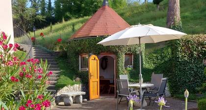 Ferienhaus mit Balkon, Terrasse, privater Terrasse, Gemeinschaftsgarten und WLAN