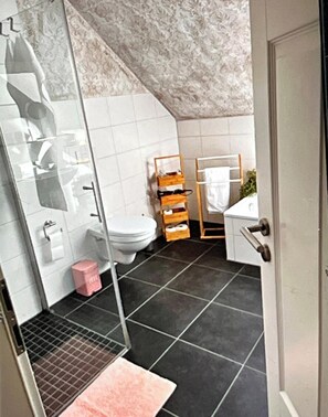 Bathtub, hair dryer, towels