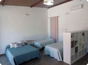 1 dormitori, planxa i posts de planxar, Internet i roba de llit 