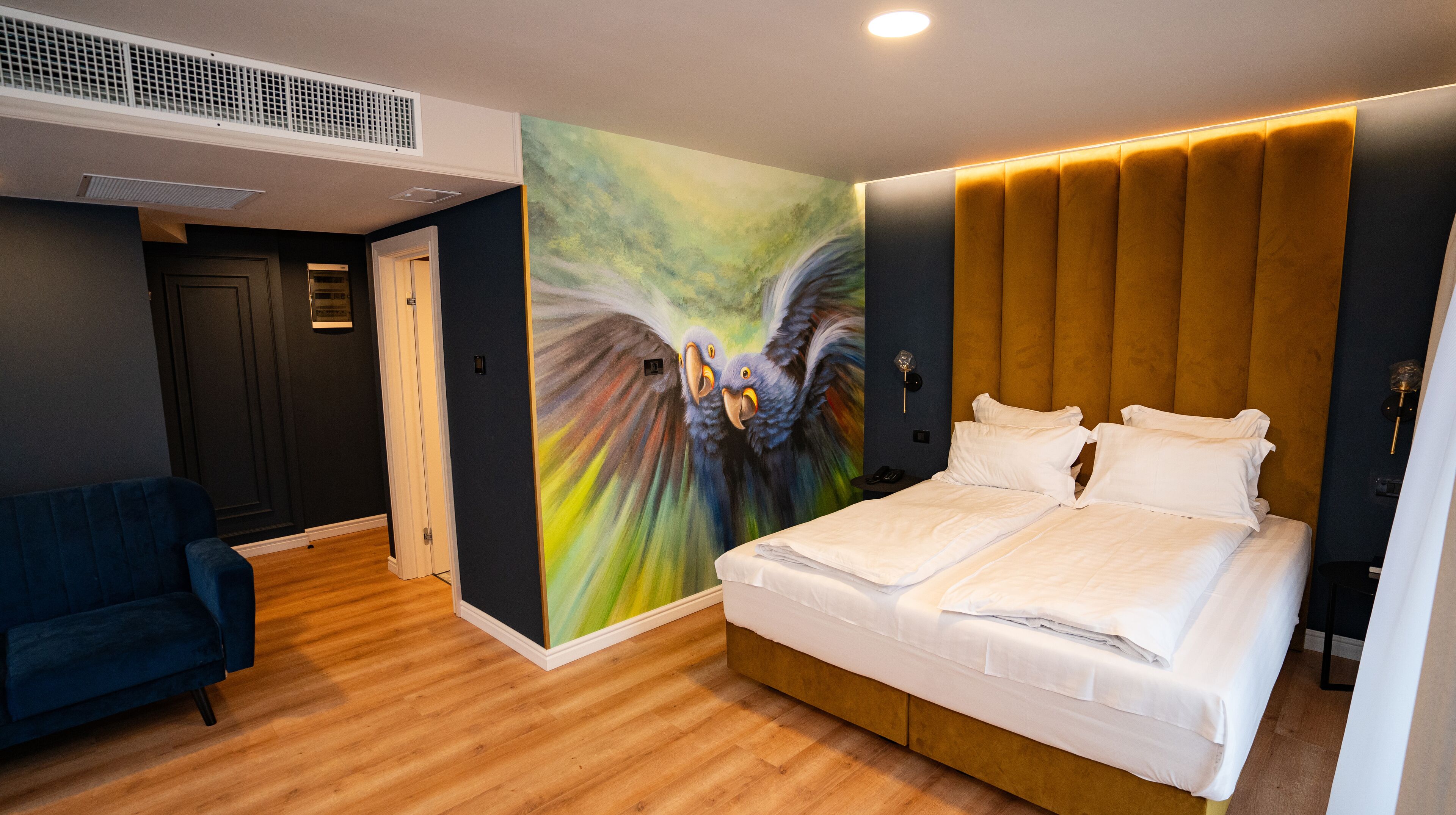 family room | 1 bedroom, premium bedding, free minibar, in-room safe