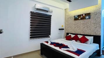 Family Room | Premium bedding, memory-foam beds, desk
