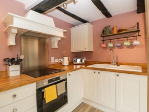 Fridge, electric kettle, cookware/dishes/utensils