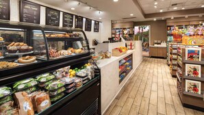 A bakery counter with various baked goods and a deli section with packaged salads and sandwiches. - Marriott Shadow Ridge I 2 Bedroom (Palm Desert)