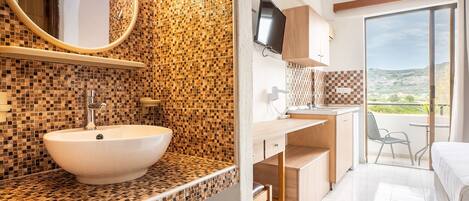A bathroom with a mosaic tile wall, a sink, and a mirror.