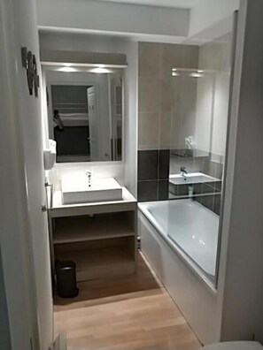 Bathtub, hair dryer