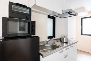 City Apartment, Non Smoking (Stay 1st 201) | Private kitchen | Full-size fridge, microwave, stovetop, electric kettle - STAY 1ST (Osaka)