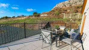 Outdoor dining - Bron Heulog -  a dog that sleeps 6 guests  in 3 bedrooms (Llanerchymedd)