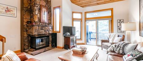 Smart TV, fireplace, books