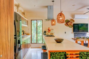 Fridge, stovetop, coffee/tea maker, cookware/dishes/utensils