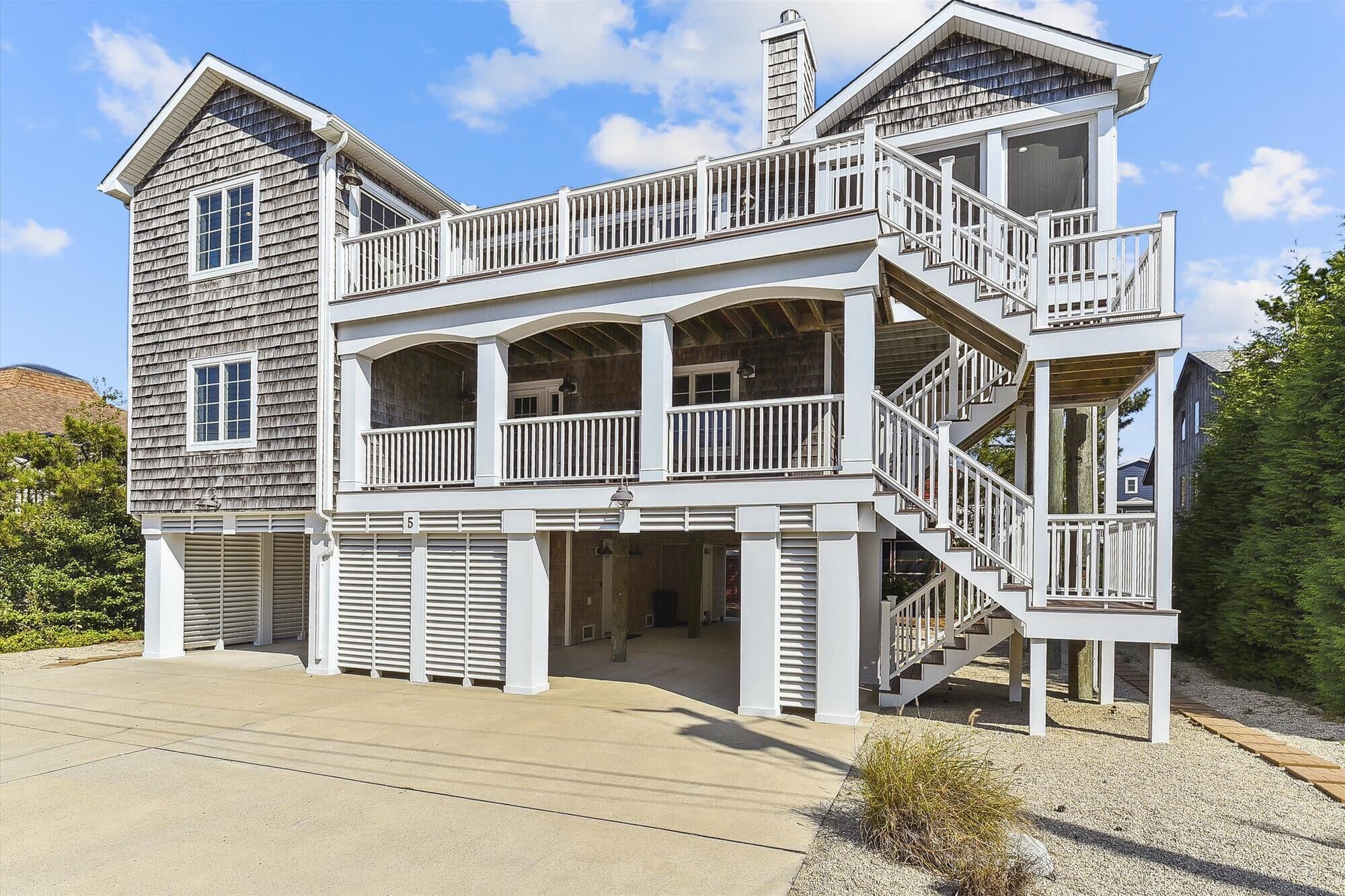 NEW LISTING 2024! Exceptional custom vacation home located just steps from the beach front in beautiful family friendly South Bethany!