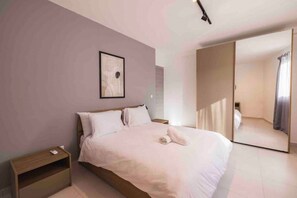 2 dormitorios, tabla de planchar con plancha, wifi gratis y ropa de cama