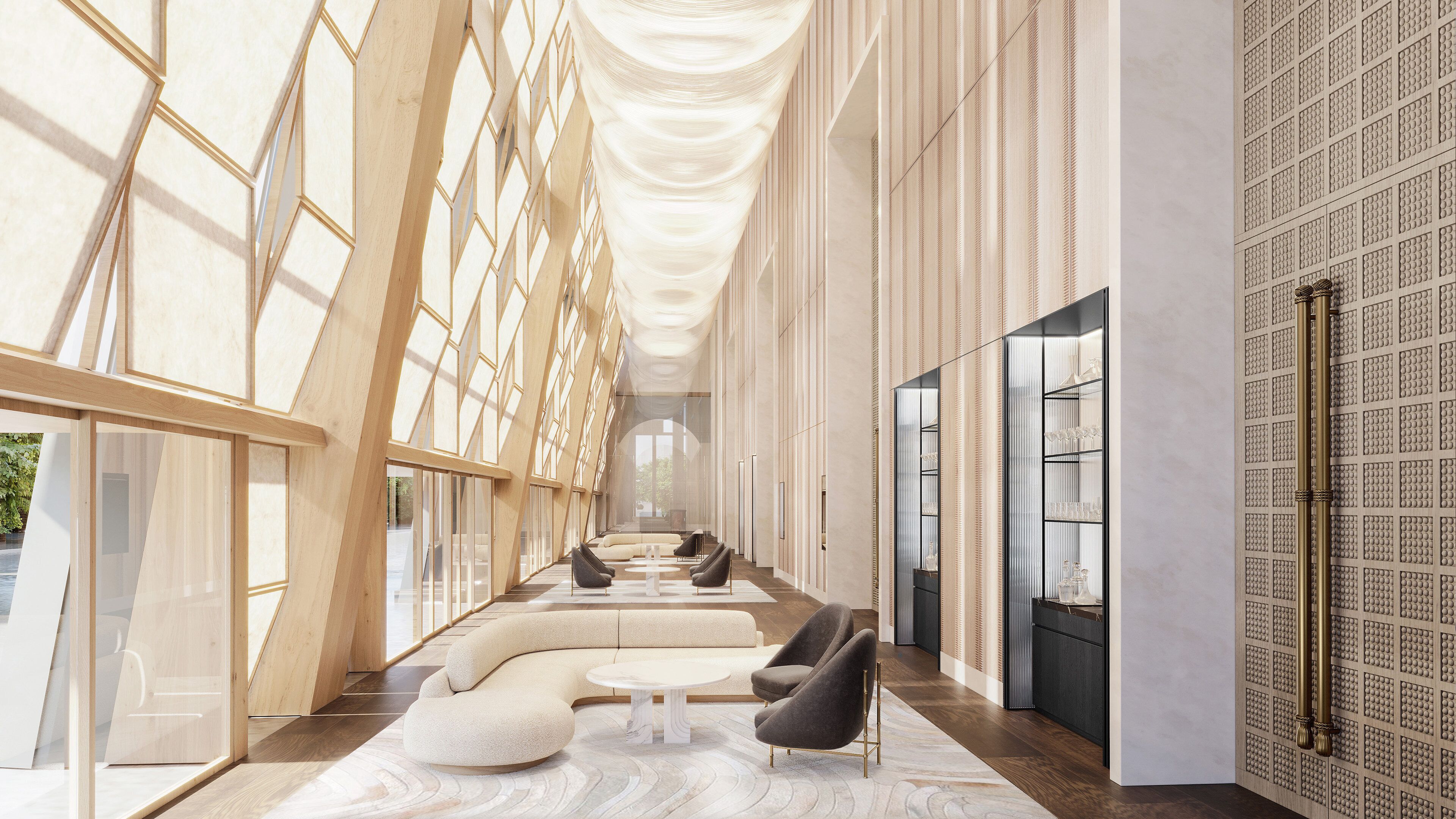 Ein großzügiger Korridor mit modernem Design, der eine Sitzecke mit Sofas und Sesseln, eine Glastrennwand auf der einen Seite und eine Wand mit Musterung auf der anderen Seite bietet.