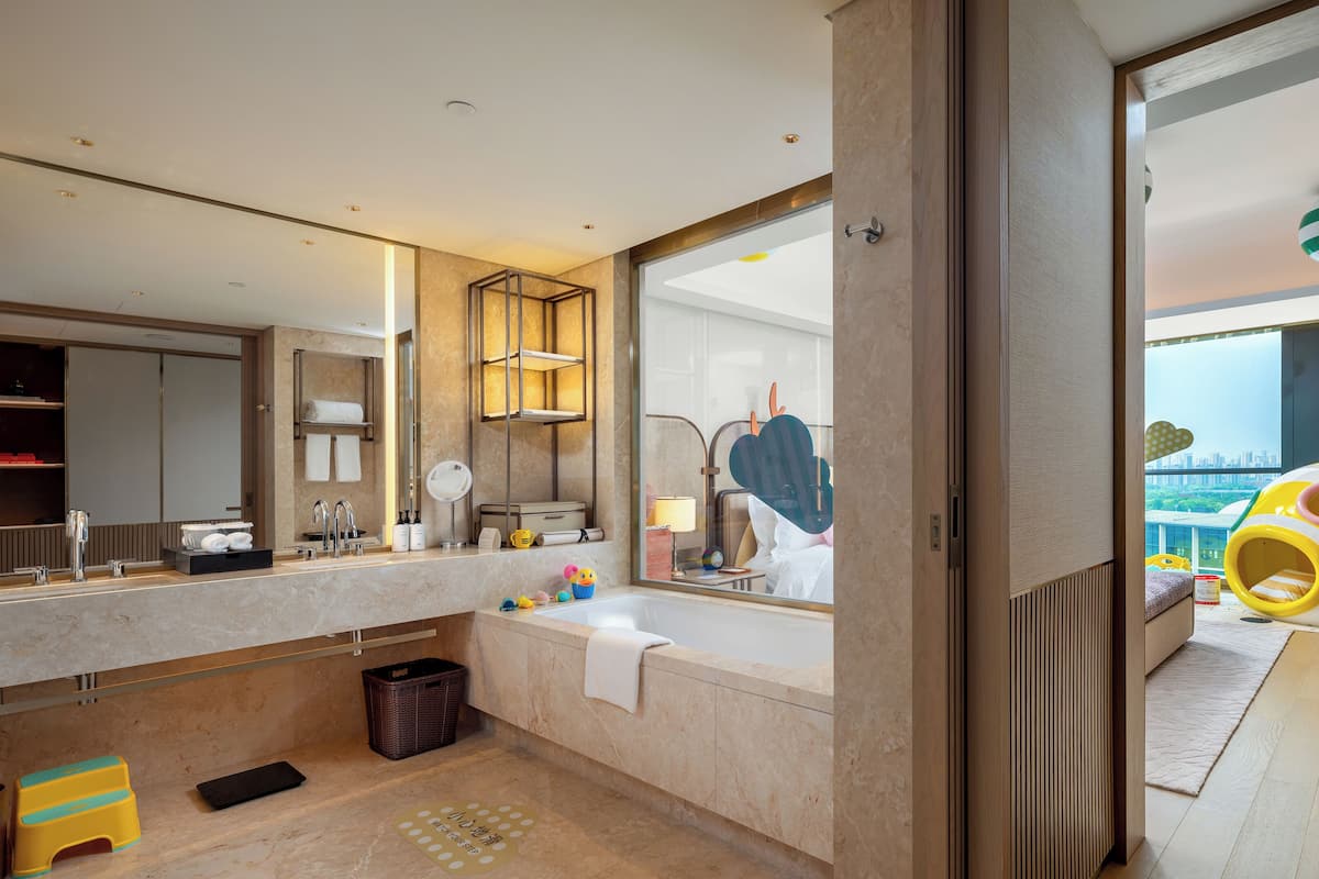 Classic Room, 1 King Bed (Kids Theme) | Bathroom | Separate bathtub and shower, rainfall showerhead, designer toiletries