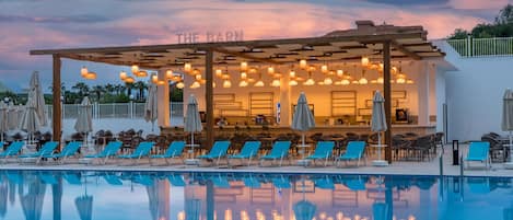 Indoor pool, seasonal outdoor pool, pool umbrellas, pool loungers