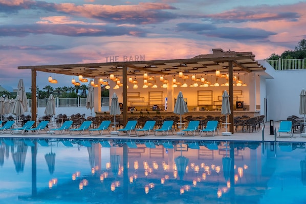 Indoor pool, seasonal outdoor pool, pool umbrellas, sun loungers