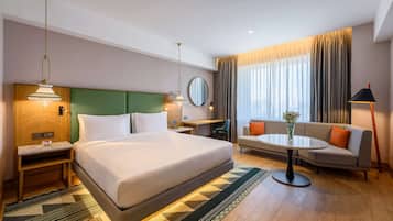 Premium bedding, down duvets, in-room safe, desk